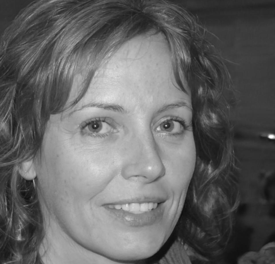 Professional woman representing successful investment education graduate